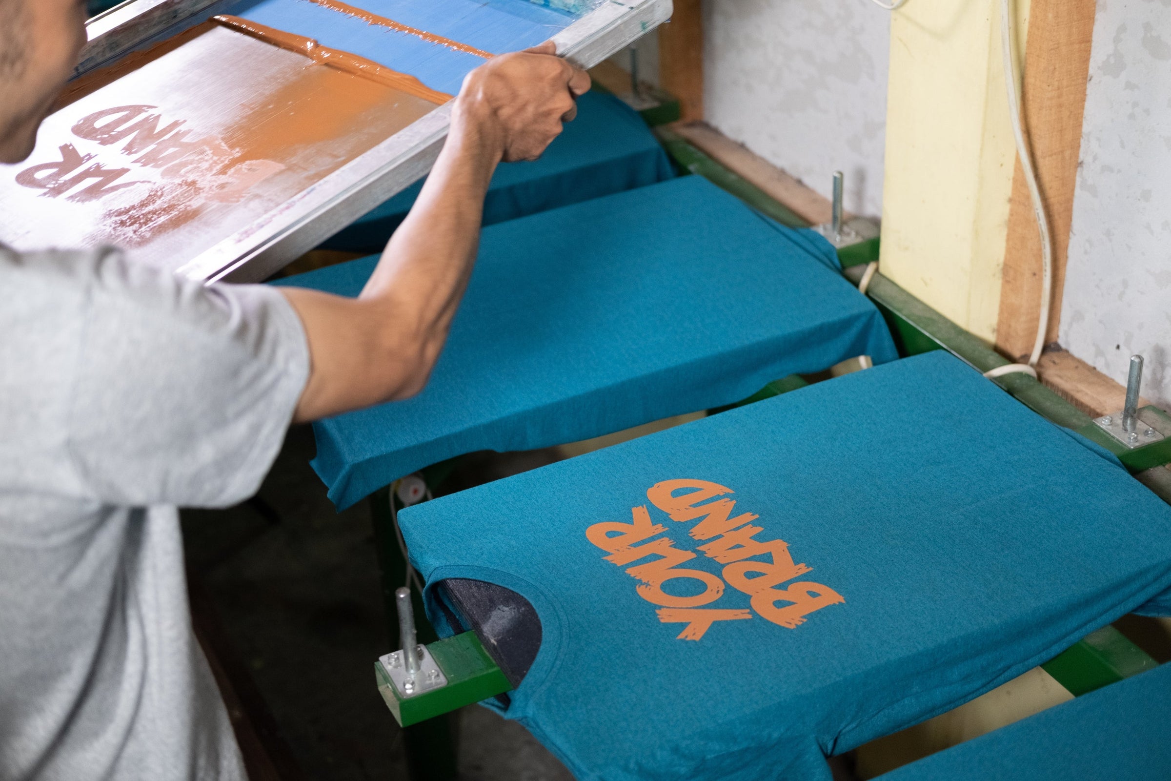 Custom printing process showing how to print your logo on clothes with vibrant designs and premium quality