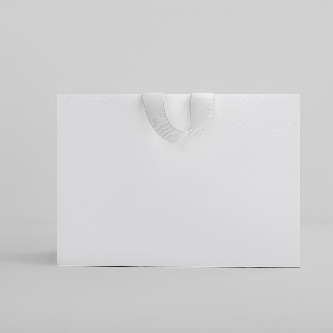 White customizable retail bag with wide handles for easy carrying by dreamwithreem