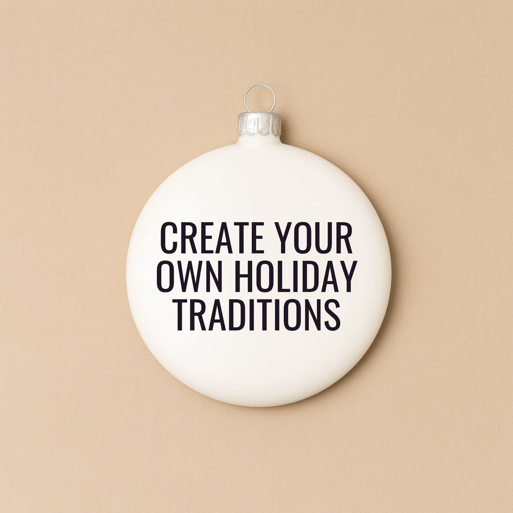 Personalized holiday ornament with text 'Create Your Own Holiday Traditions' for festive décor
