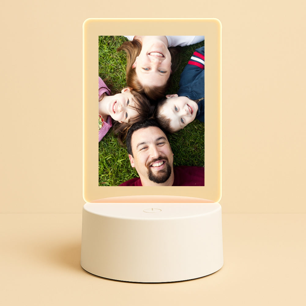 Personalized photo LED frame displaying a family portrait with a warm glowing light