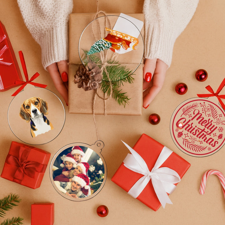 Personalized unique Christmas bauble gift featuring family photos and festive decorations on a gift table