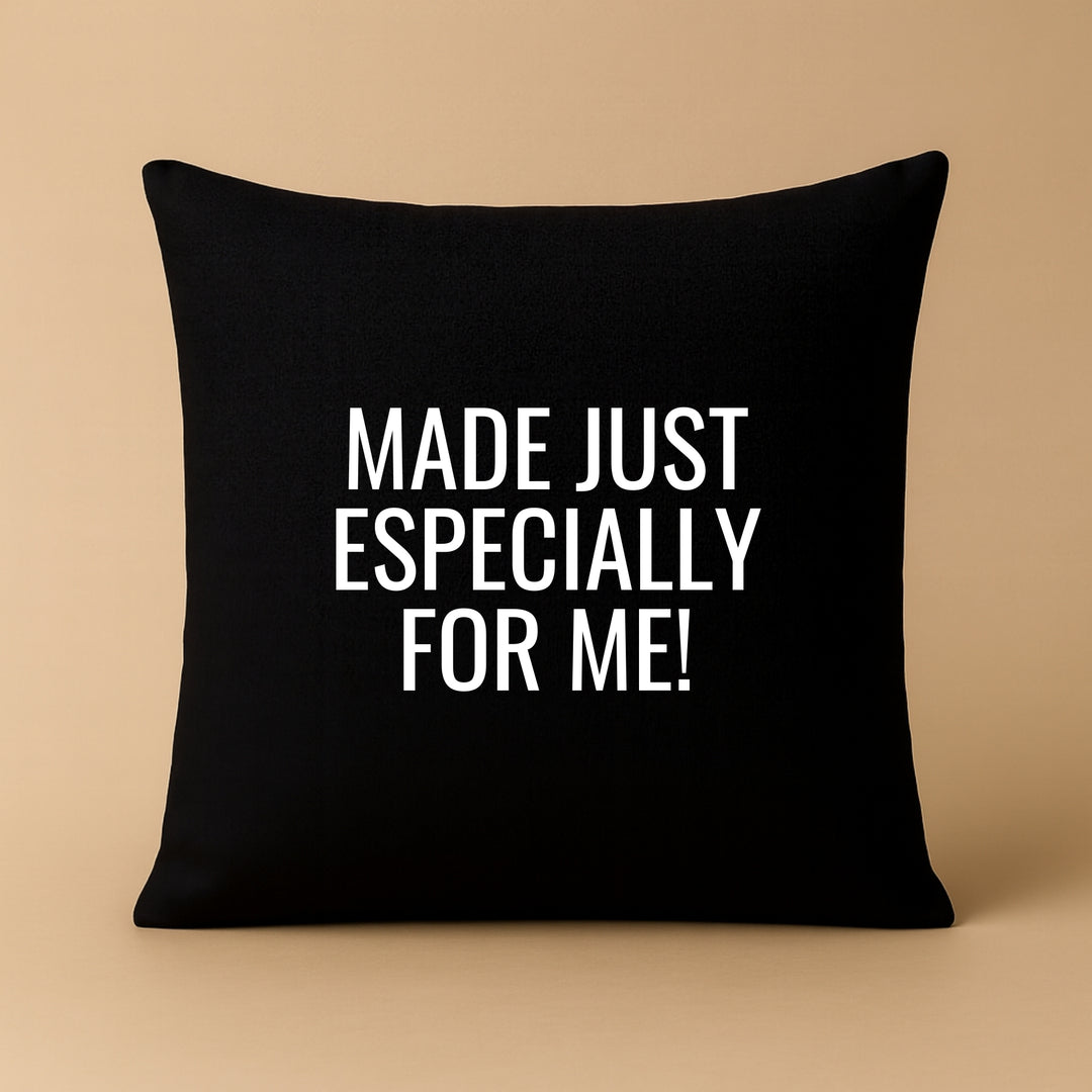 Custom pillow cover in black with the phrase made just especially for me in white text