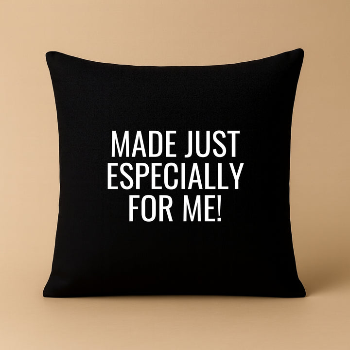 Custom pillow cover in black with the phrase made just especially for me in white text