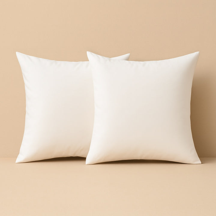 Two cream-colored custom pillow covers perfect for home décor and personalized gifts