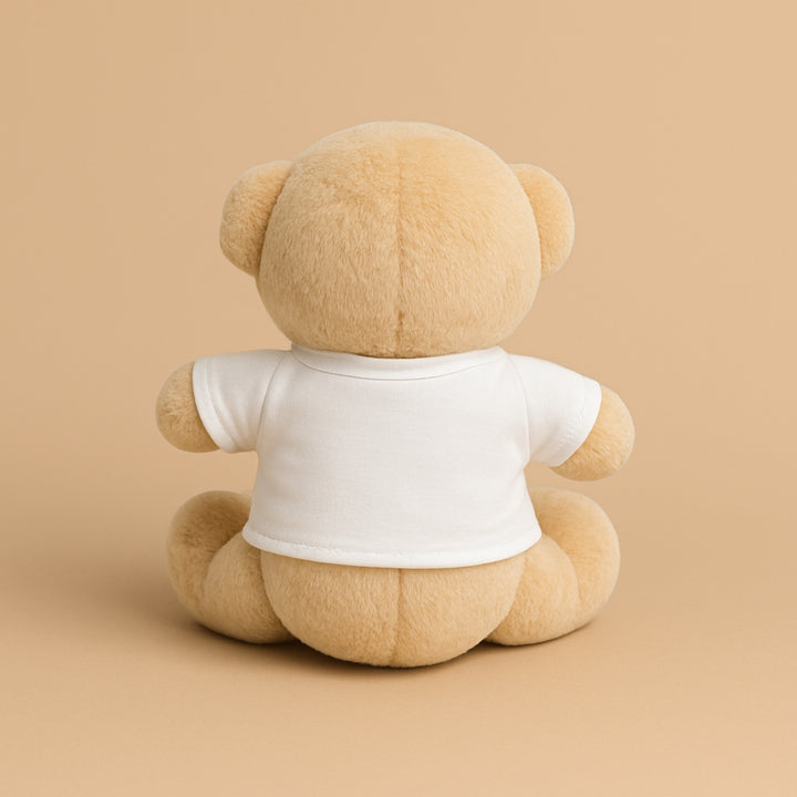 Custom teddy bear with shirt featuring a soft beige plush design and a blank white shirt