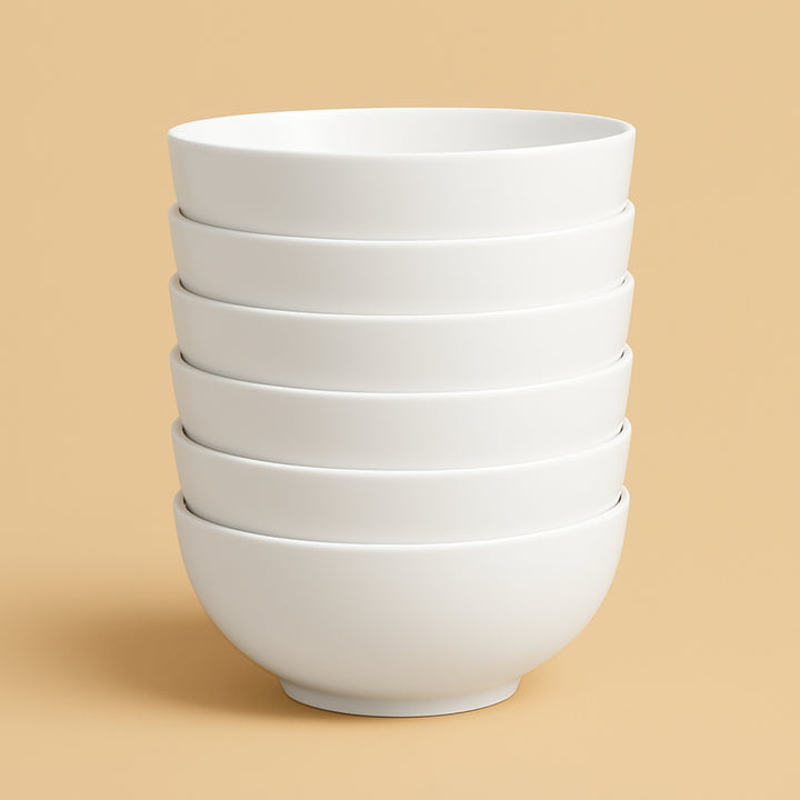 Stack of six elegant white ceramic bowls, perfect to buy ceramic bowls online for stylish dining