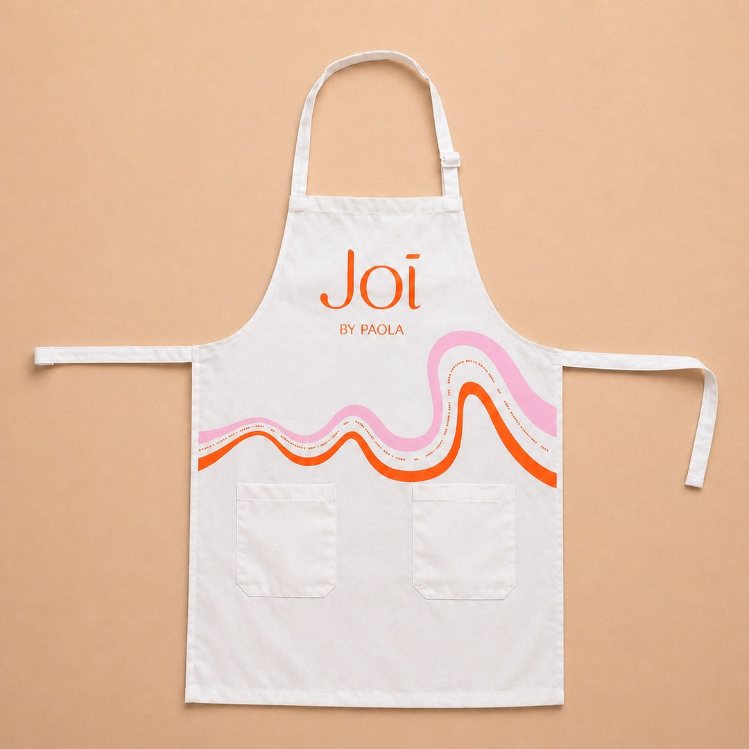 Custom apron featuring a colorful wavy design by Joi by Paola for kitchen or crafting use