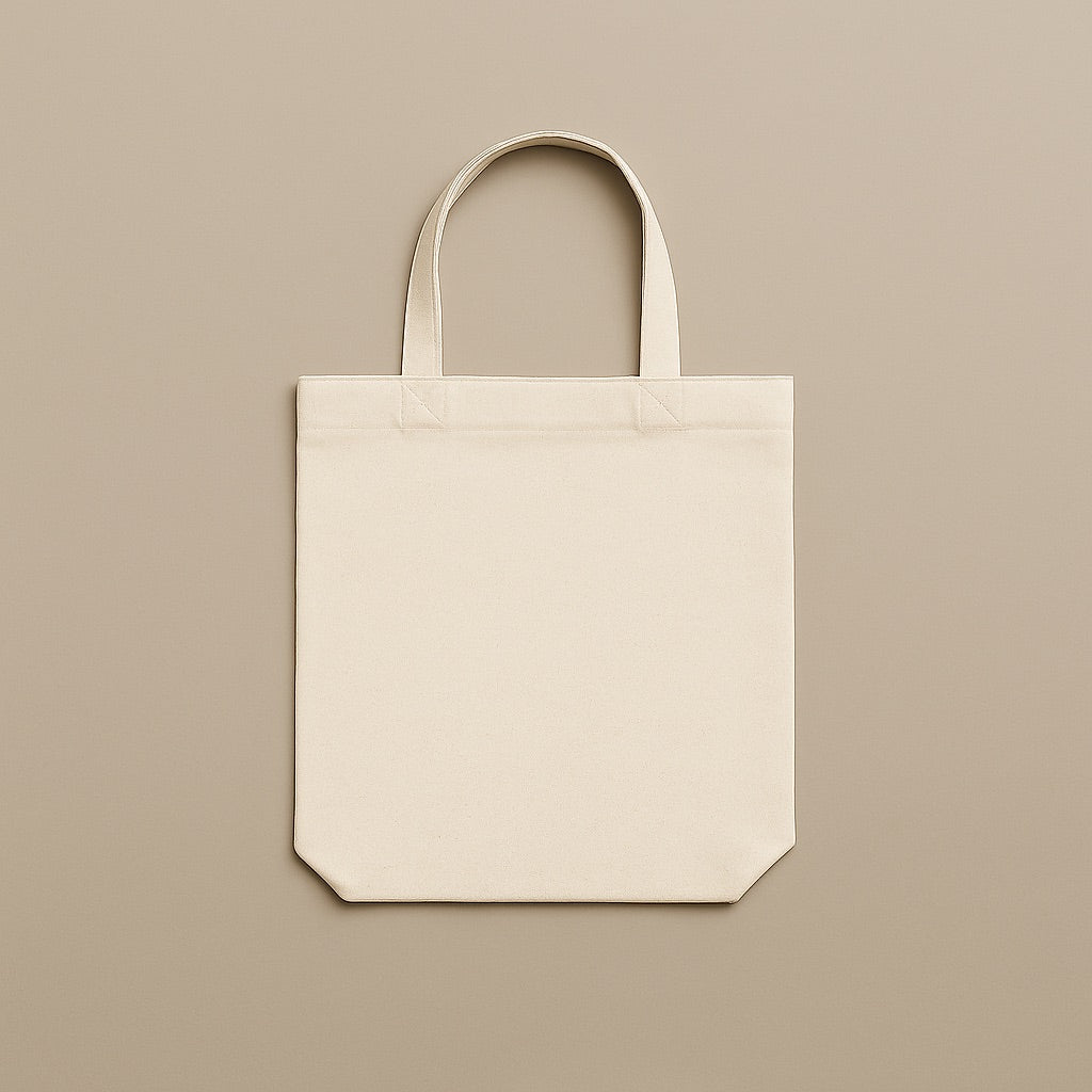 Dreamwithreem plain beige custom canvas tote bag with sturdy handles on neutral background