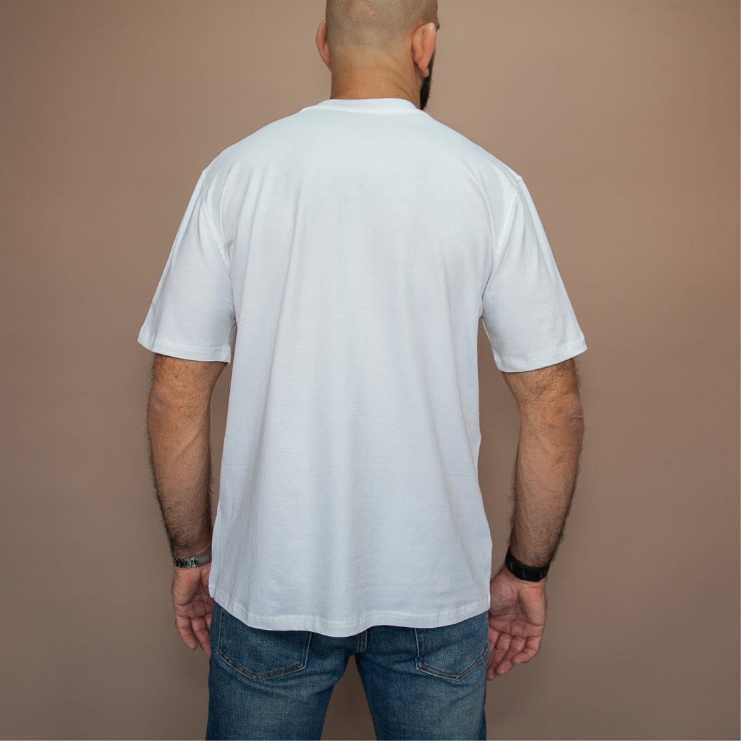 Back view of a man wearing a custom classic fit t-shirt in white with short sleeves