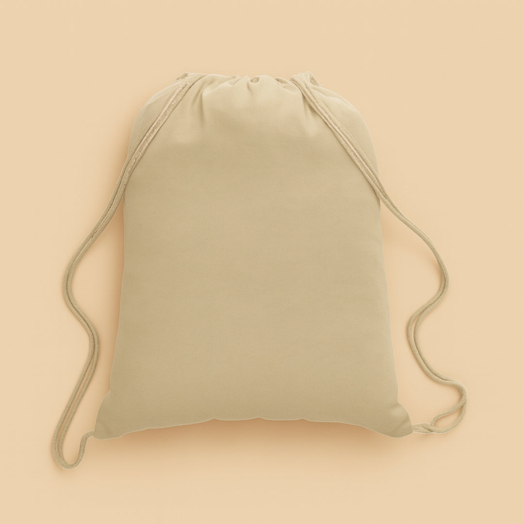 Beige custom cotton drawstring bag with adjustable straps for everyday use and travel