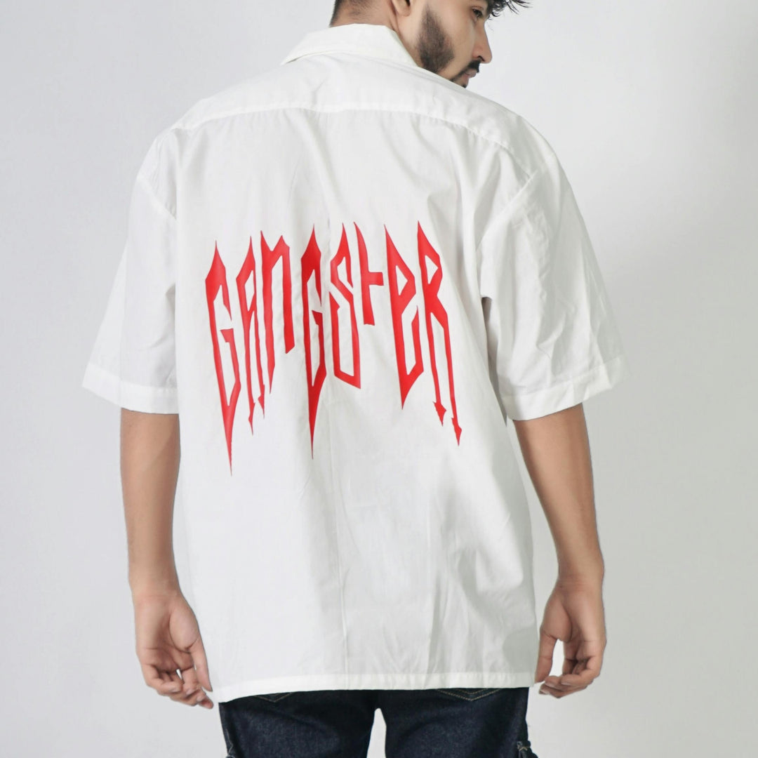 Back view of a white shirt featuring bold red lettering 'GANGSTER' showcasing custom DTF print service