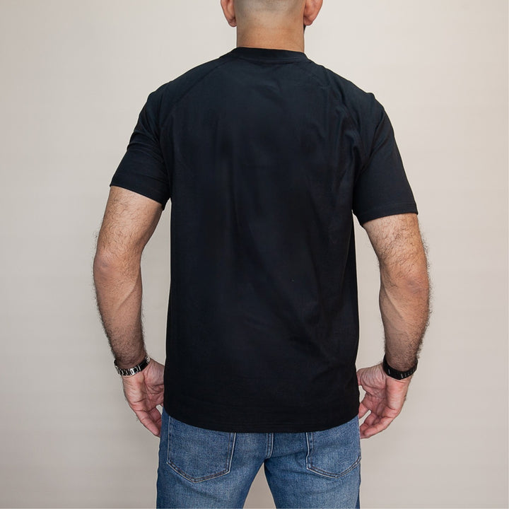 Back view of a black custom gym t shirt designed for comfort and style during workouts