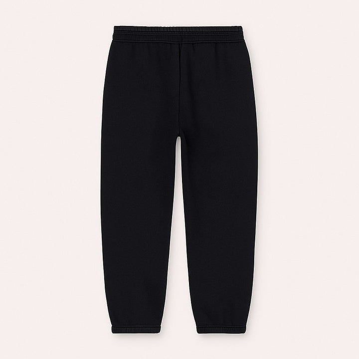 Black custom joggers for men and women with elastic waistband and cuffed ankles