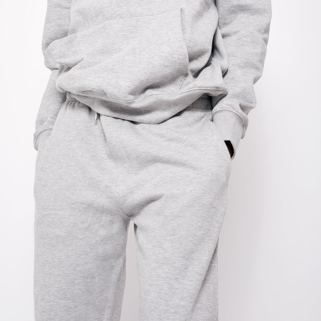 Cozy gray custom joggers for men and women with a relaxed fit and side pockets