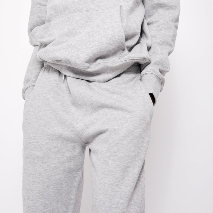 Cozy gray custom joggers for men and women with a relaxed fit and side pockets