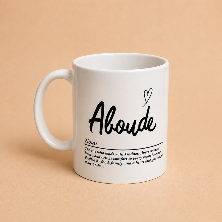 Custom mugs featuring the word 'Aboude' with a definition to inspire kindness and love