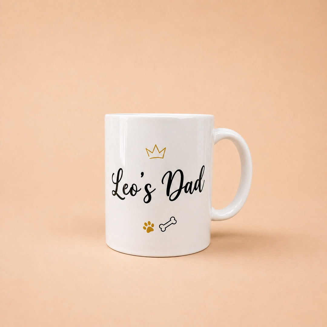 Custom mugs featuring Leo's Dad design with paw prints and a bone