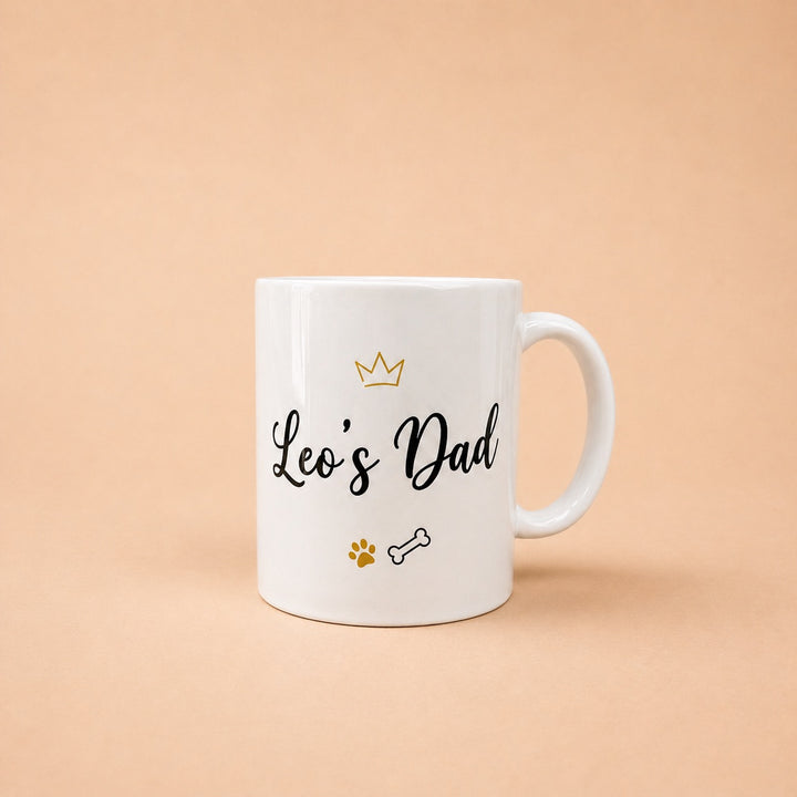 Custom mugs featuring Leo's Dad design with paw prints and a bone