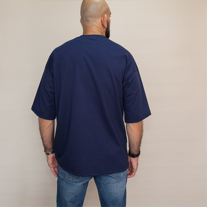 Back view of a navy custom oversized tee designed for comfort and style