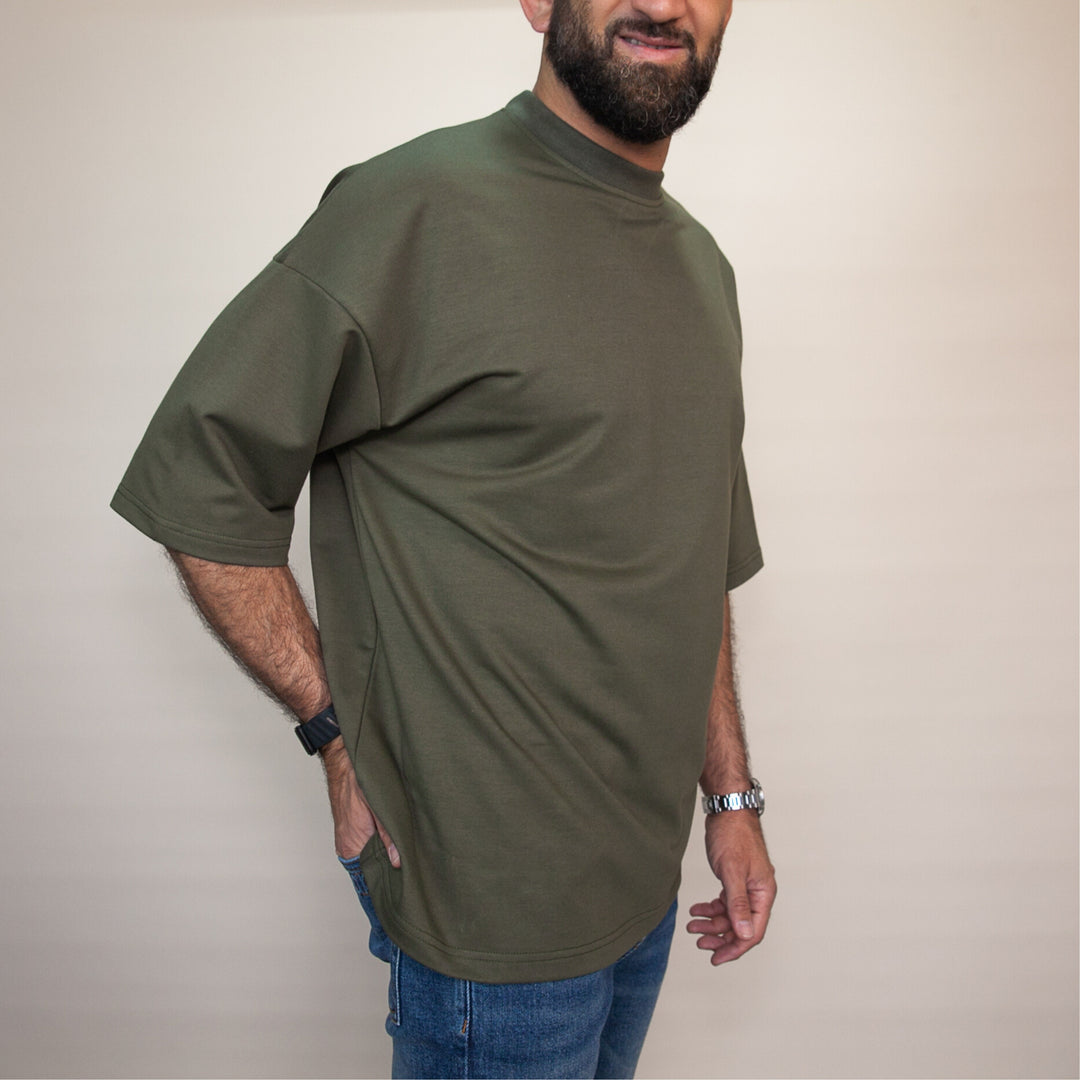Custom oversized tee in olive green with a relaxed fit for casual and comfortable wear