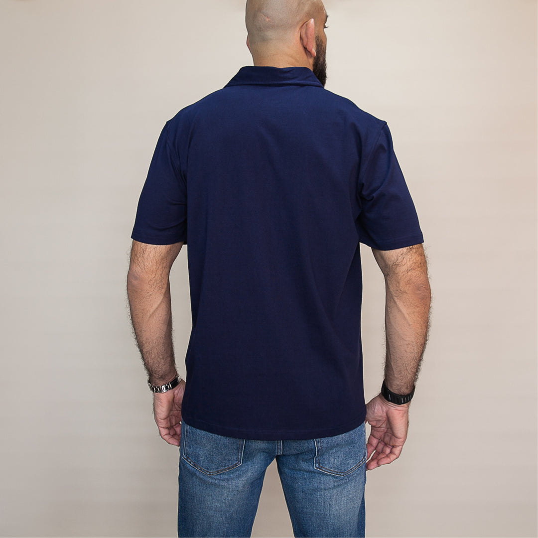 Back view of a navy custom polo t-shirt by dreamwithreem for casual and professional wear