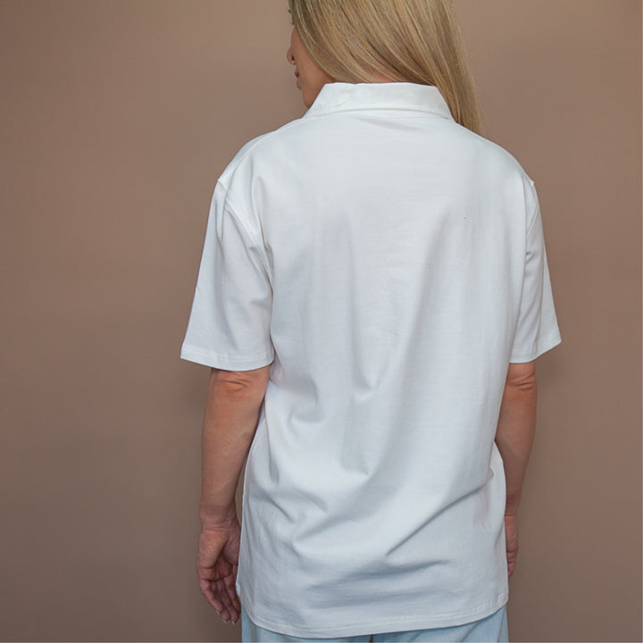 Back view of a custom polo t-shirt by dreamwithreem in classic white for a comfortable fit