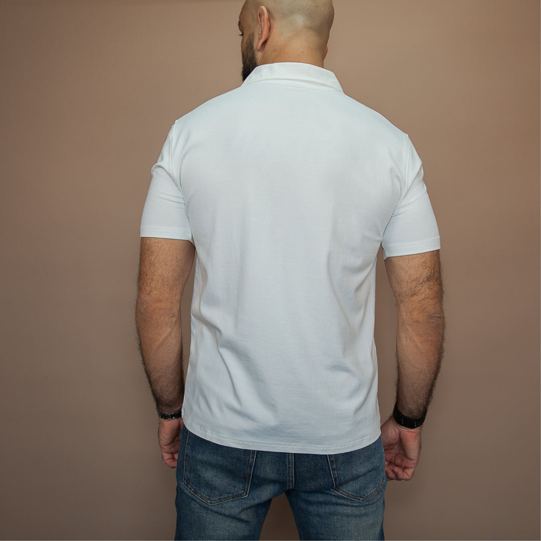 Back view of a custom polo t-shirt in white by dreamwithreem, ideal for casual or professional wear