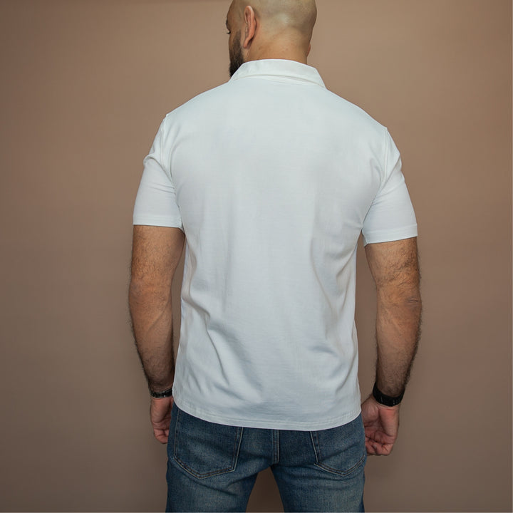 Back view of a custom polo t-shirt in white by dreamwithreem, ideal for casual or professional wear