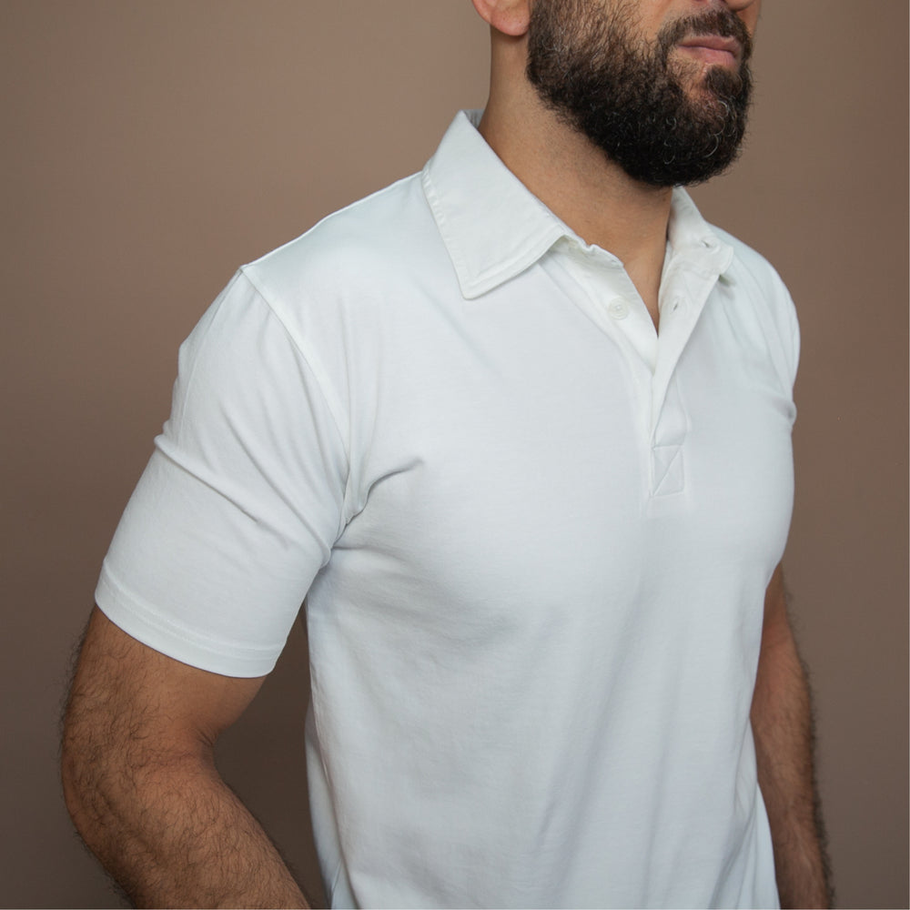 White custom polo t-shirt featuring a classic design and comfortable fit for everyday wear