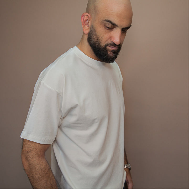 Custom relaxed fit t-shirt in white, perfect for casual wear and comfortable styling