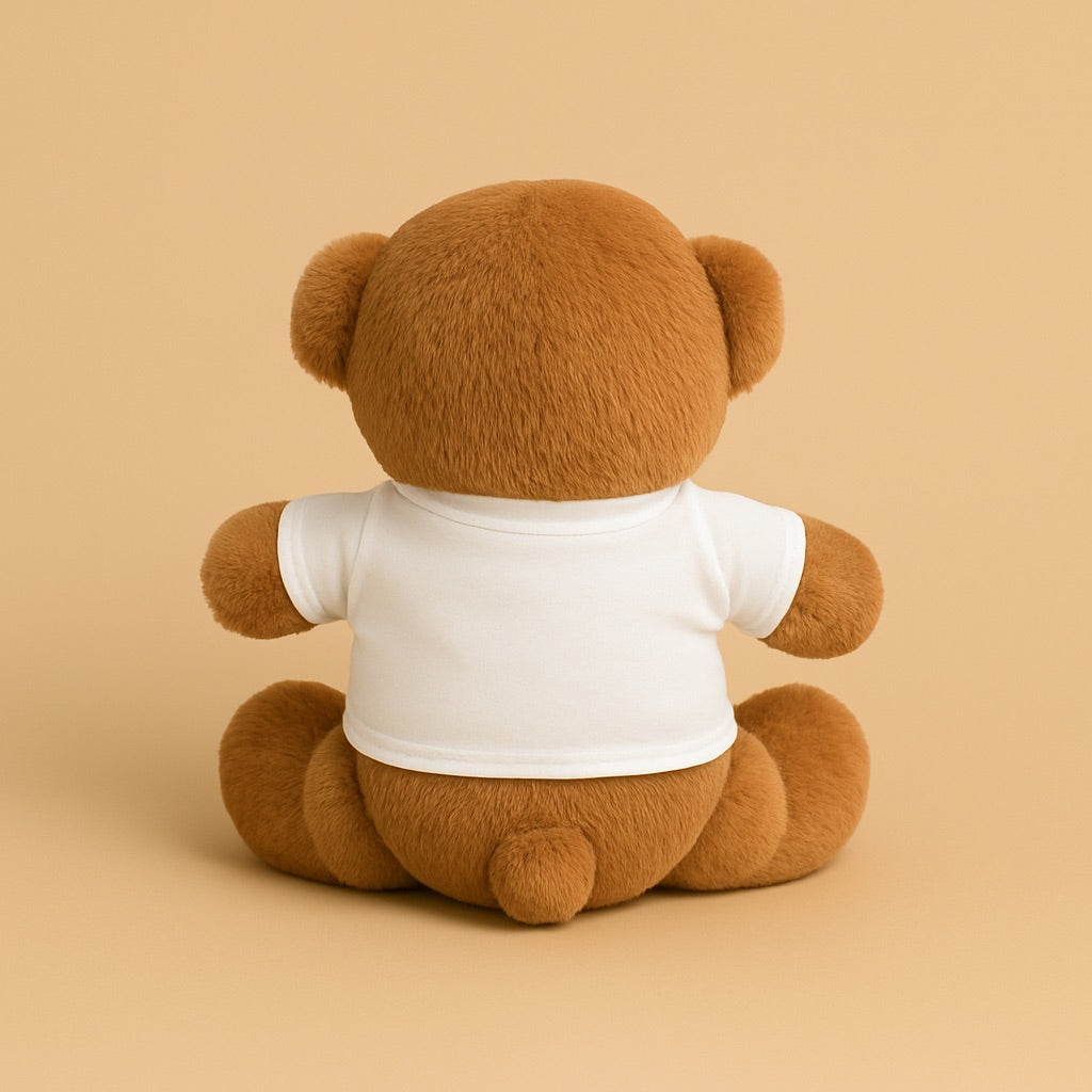 Custom teddy bear with shirt in a soft brown color, showcasing a plain white shirt on its back