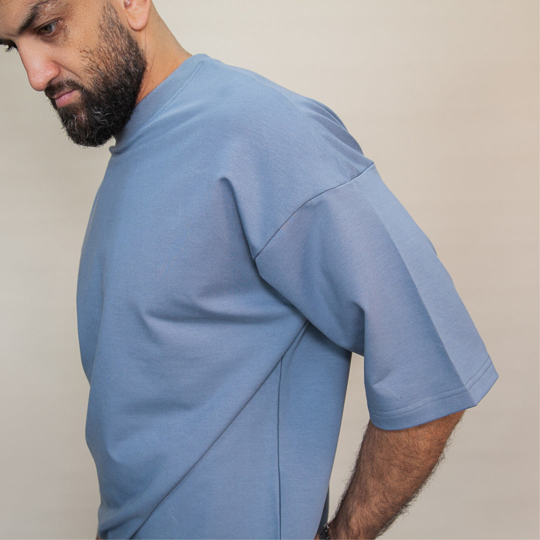 Stylish custom two-piece set featuring a comfortable oversized shirt in light blue color