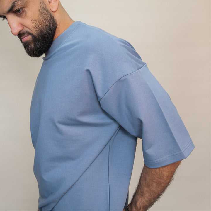 Stylish custom two-piece set featuring a comfortable oversized shirt in light blue color