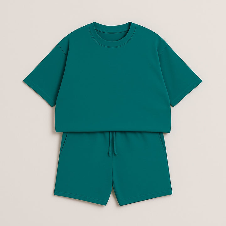 Teal casual custom two-piece set with short sleeves and matching shorts laid flat