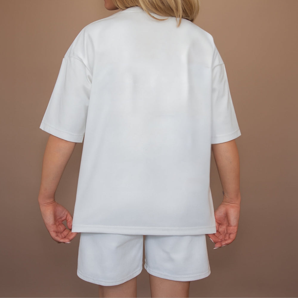 Custom two-piece set in white featuring a comfortable oversized t-shirt and matching shorts