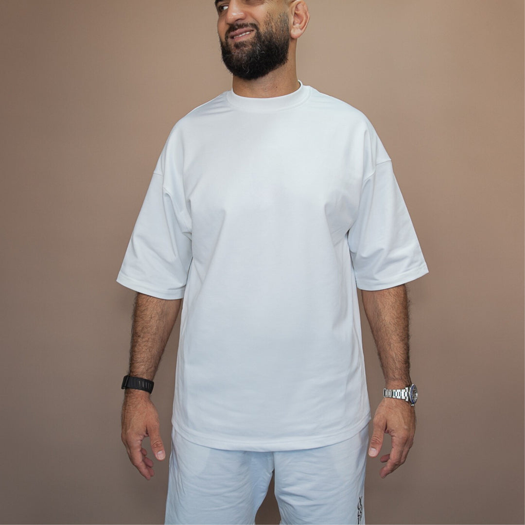 Men's custom two-piece set in white featuring a relaxed fit t-shirt and matching shorts