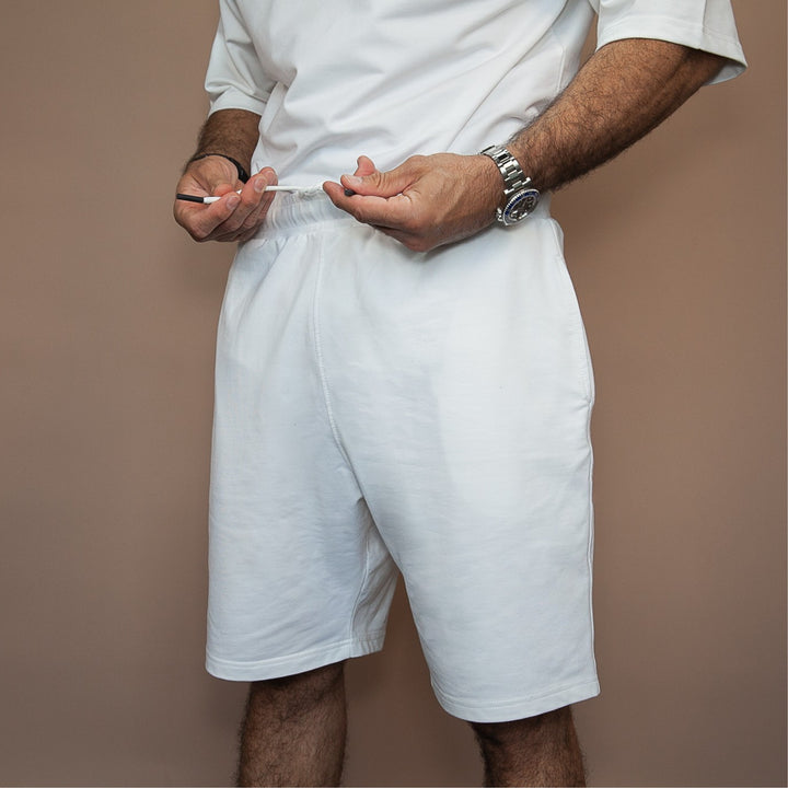 Custom two-piece set featuring a relaxed fit t-shirt and comfortable shorts in white