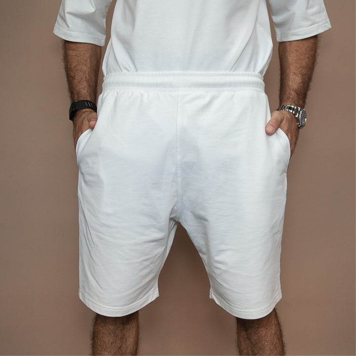 Men's custom two-piece set featuring comfortable white shorts with pockets and a relaxed fit