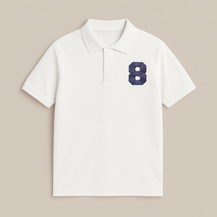 White custom printed polo shirt by dreamwithreem with navy textured number 8 on left chest