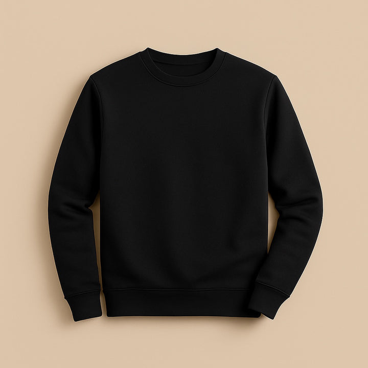 Black crewneck sweatshirt on beige background from dreamwithreem ready to design your own sweatshirt online for custom printing