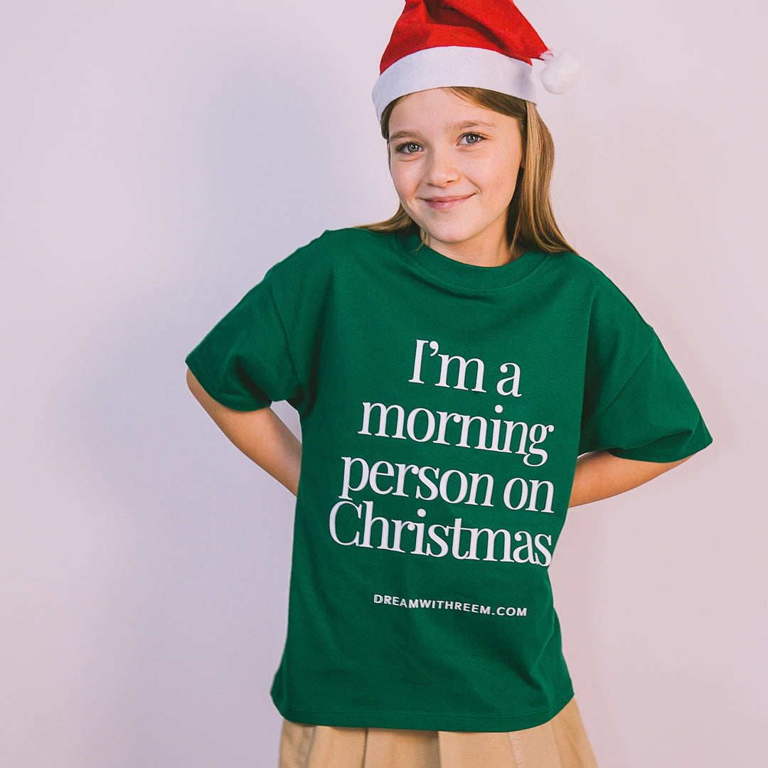 Custom green Christmas morning t-shirt with playful text for holiday celebrations