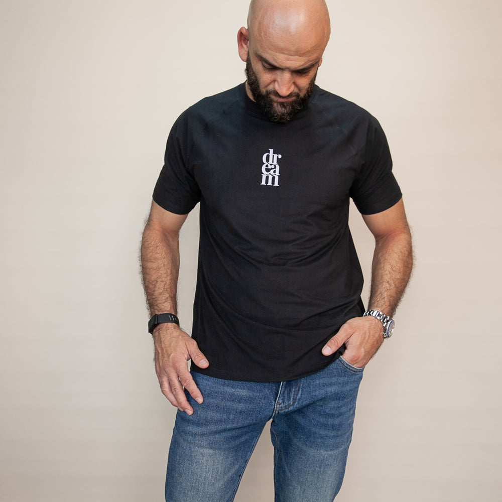 Men's black custom T-shirt from dreamwithreem featuring the logo, perfect for expressive fitness apparel