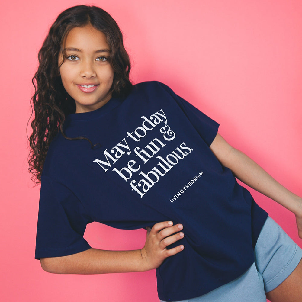 Young girl wearing fashionable custom shirts with positive quote navy blue t-shirt by dreamwithreem