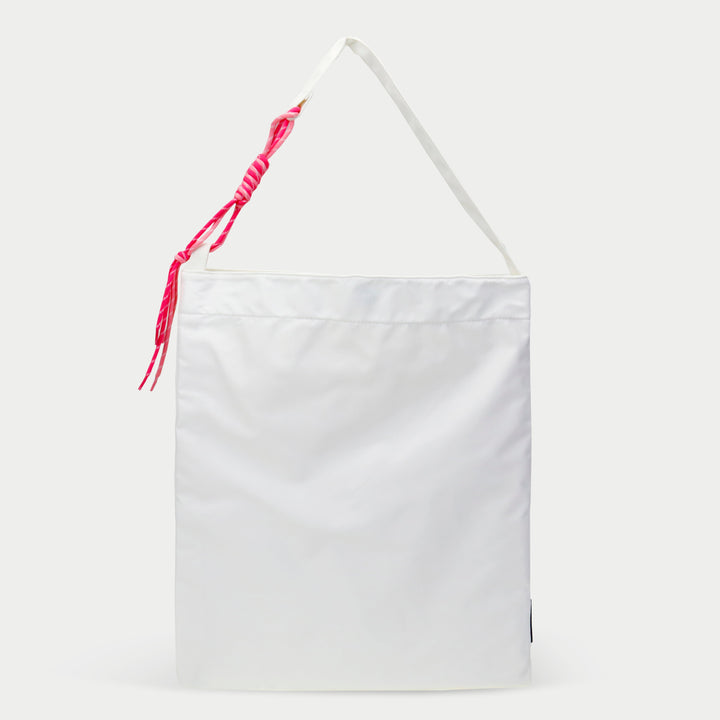 White Custom Tote Zipper Pocket bag with adjustable shoulder strap and pink tassel accessory