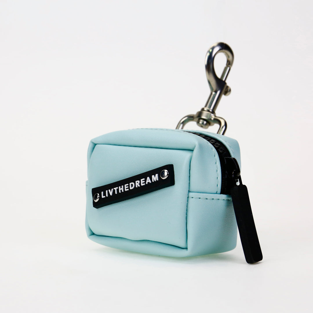 Light blue mini pouch keychain by dreamwithreem featuring unique fashion accessories branding