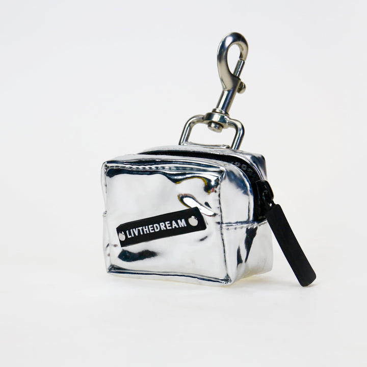 Silver metallic small pouch keychain by dreamwithreem unique fashion accessories with LIVTHEDREAM label