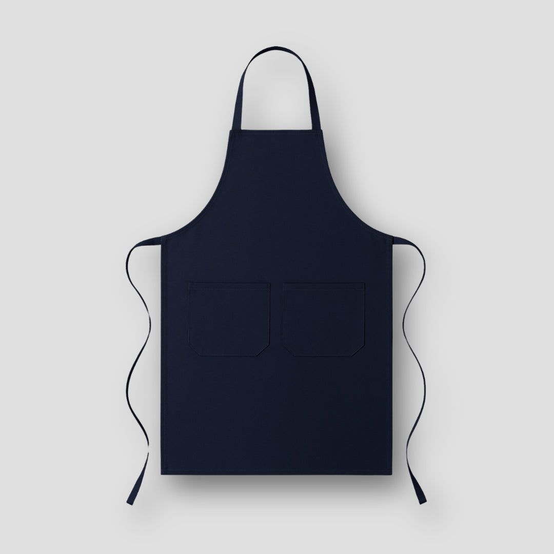 Solid navy blue apron with two front pockets perfect for personal expression aprons