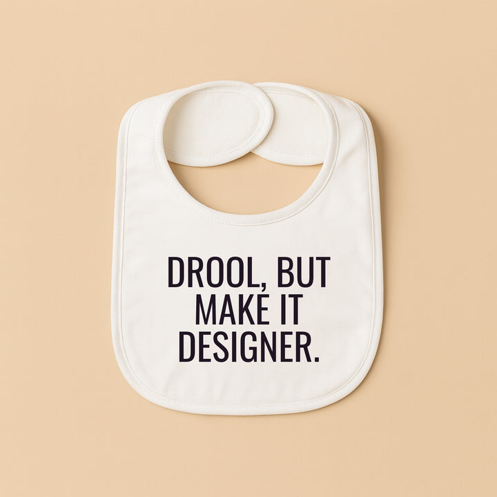Personalized baby bib with fun text that says drool but make it designer for stylish infants