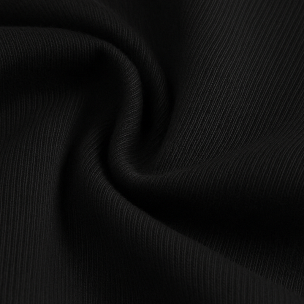 Soft black fabric ideal for a personalized baby bodysuit by dreamwithreem