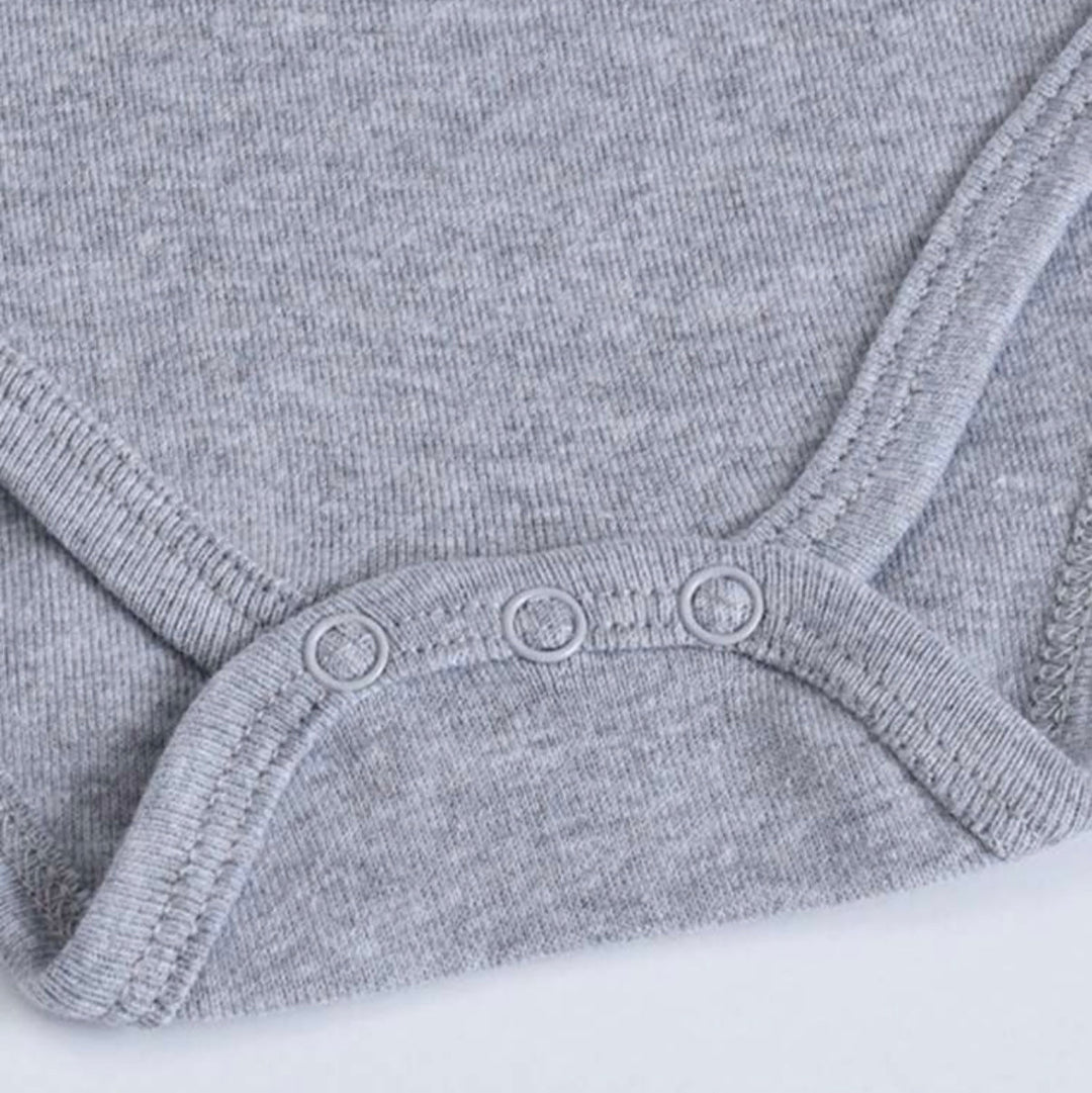 Close-up of a gray personalized baby bodysuit with snap closures for easy dressing